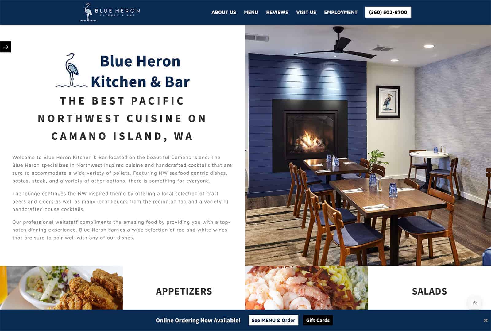 Interior view of Blue Heron Kitchen & Bar featuring a cozy fireplace, dining tables, and modern decor on Camano Island, WA.