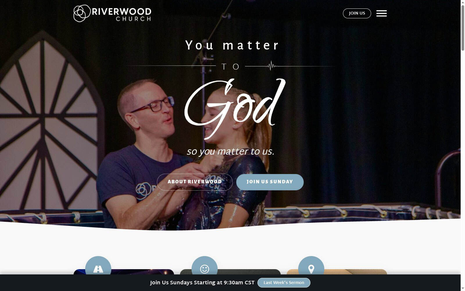 A man with glasses and a blue shirt speaking at Riverwood Church during a service.